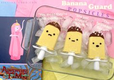 three popsicles in the shape of cartoon characters