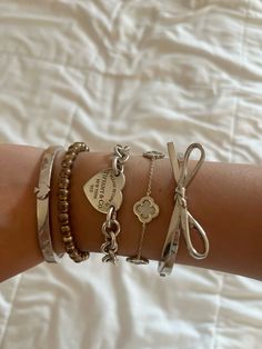 kate spade, tiffany & co Jewellery For School, Tiffany And Co Bracelet Silver, Tiffany Stacked Bracelets, Kate Spade Bracelet Stack, Gold And Silver Jewelry Stack, Tiffany And Co Jewelry Aesthetic, Tiffany Bracelet Aesthetic, Tiffany And Co Bracelet Stack, Tiffany Necklace Stack