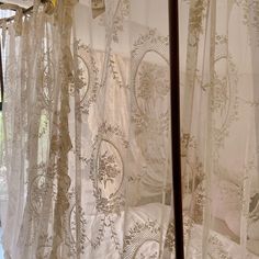 the curtains are open and ready to be hung in the room for guests to use