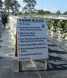 a sign that says farm rules on it