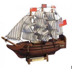 a model sailing ship with british flags on it