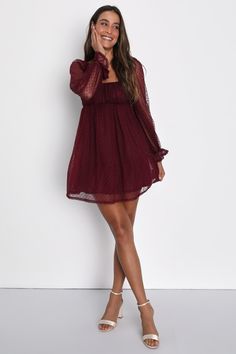 Grab your favorite heels and head out the door looking like a real-life dream in the Lulus Dreamy Sweetness Burgundy Swiss Dot Ruffled Mini Babydoll Dress! This ultra-sweet dress features a gauzy sheer mesh overlay with darling Swiss dots throughout that shapes a square neckline, a gathered bodice, and sheer long sleeves with ruffled, elasticized shoulders and cuffs. High waist sits atop a cute babydoll skirt (with a layer of tulle for a voluminous effect) that ends at a flirty mini hem. Hidden back zipper/clasp. Fit: This garment fits true to size. Length: Mid-thigh. Size medium measures 31" from shoulder to hem. Bust: Great for any cup size. Waist: Fitted - very fitted at natural waist. Hip: Not Fitted - fuller skirt allows room for hips. Undergarments: May be worn with a strapless bra, Womens Christmas Dress Holiday Parties, Long Sleeve Dance Dresses, Burgundy Mini Dress Long Sleeve, Winter Formal Dresses Short Flowy, Fall Brunch Dress, Fall Dresses With Cowgirl Boots, Burgundy Winter Dress, Babydoll Prom Dress, Hoco Dresses Ruffle