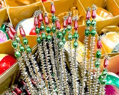 an assortment of christmas ornaments in boxes