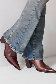 A Western style gets a dialed-down, edged-up look with these extreme pointed toe boots. **Features:** Mid-calf length, leather uppers, pointed toe, block heel, dipped topline, inner leg zipper **Why We | Copenhagen Pointed Boots by FP Collection at Free People in Brown, Size: US 8.5 Heeled Western Boots, Pointed Toe Mid-calf Boots For Fall Rodeo, Brown Pointed Toe Mid-calf Boots For Fall, Pointed Toe Boots Outfit, Pointed Toe Mid-calf Boots For Rodeo, Jeans With Boots, Pointed Boots Outfit, Chic Pointed Toe Mid-calf Boots With Zipper, Western Brown Mid-calf Boots With Pointed Toe