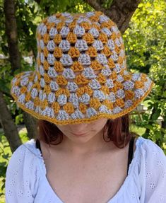 A fun, colorful bucket hat made with the colors you like! Yellow Beach Bucket Hat, Casual Beanie For Festivals, Fun Yellow Bucket Hat For Spring, Funky Wide Brim Beach Hat, Funky Wide Brim Hat For Beach, Multicolor Casual Cloche Hat For Beach, Casual Multicolor Cloche Hat For The Beach, Casual Multicolor Cloche Hat For Beach, Casual Handmade Bucket Hat