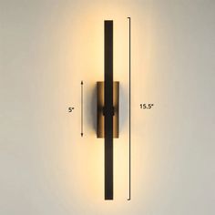 an image of a wall light that is on the side of a wall with measurements