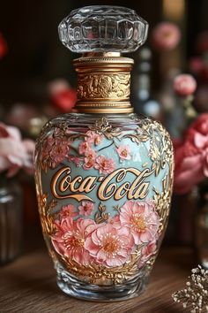 a glass bottle with flowers painted on it