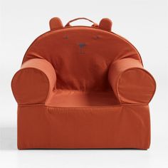 an orange children's chair with bear ears on the back and arms, sitting in front of a white background