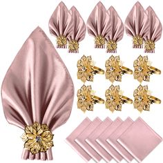 a set of napkins with gold flowers on them and matching napkins for each other