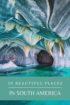 the inside of a cave with blue water