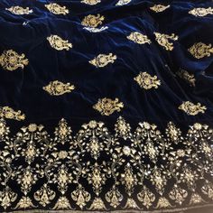 Women Velvet Wrap/Shawl In Midnight Blue E Beautiful Gold Thread N Sitar’s Embroidery @Both Ends N Gold Thread Motif Spatter Throughout Rest. Fabric:Pure/Soft/Good Quality Velvet Measurements:L95 1/2”/ Width:36 1/2” Embroidery@Ends:W:36 1/2”/Height:10”(Embroidered Portion @ Ends Is Stitched To Rest Of Velvet E Polyester Lining @Back).Coin Like Tassels@ Both Ends. Brand New Without Tag.Never Worn Extremely Pretty, Unique N Hard To Find. Bring Out Any Dress E This Wrap This Season. Elegant Blue Embroidered Fabric For Designer Wear, Elegant Traditional Wear In Royal Blue With Intricate Embroidery, Blue Traditional Wear With Gold Embroidery, Festive Blue Dupatta With Gold Embroidery, Blue Dupatta With Gold Embroidery For Festive Occasions, Royal Blue Traditional Wear With Intricate Embroidery, Elegant Velvet Embroidered Dupatta Fabric, Royal Resham Embroidery Dupatta For Festive Occasions, Blue Dupatta With Gold Embroidery For Weddings