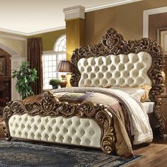 a bedroom with a bed, dresser and rug on the wooden floor in front of a fireplace