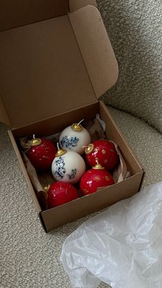 a box filled with red and white ornaments