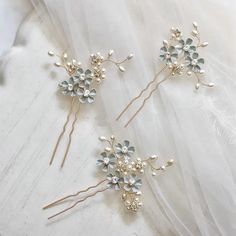 Beautiful hair accessories for any bride to be or bridesmaid. Enhance your bridal look with this set of 3 beautiful 'Forget me not' hair pins, a truly elegant bridal hair piece. The perfect wedding accessories, gift for her, bachelorette party or bridal shower idea. Design Details: * Wedding Hair Pins. * Material: Zinc Alloy with Pearl and Crystal Rhinestones. * Enamel 'Forget me knot' Flower Details with Pearl and Crystal  * Colour Availability: Gold with Blue * Set of 3 Made with love for your Blue Hair Pins, Bridal Hair Pins Pearl, Gold Hair Pin, Gold Headpiece, Beautiful Hair Accessories, Gold Hair Accessories, Head Pieces, Pearl Hair Pins, Bridal Hair Flowers