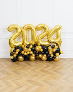 the balloon numbers are black and gold