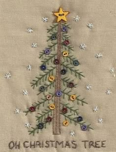 an embroidered christmas tree is shown on a piece of cloth with the words, oh christmas tree