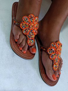 This would double as a great summer accessory as well as a gift either for birthdays or Christmas. It is 100% handcrafted using colourful beads from JayAfribeads. Summer gift for her Beach sandal Custom orders allowed for all items upon request, please convo me beforehand. A fitting guide is provided on every listing but incase of any question please reach out to me. We ship via DHL express. Thank you for visiting our shop and we hope you enjoy your purchase. Beads Sandals, African Sandals, Women Summer Sandals, Bride Heels, Beaded Flip Flops, Bohemian Sandals, Beaded Ankle