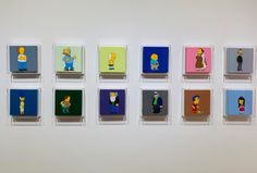 the simpsons characters are arranged in different colors on glass blocks with magnets attached to them