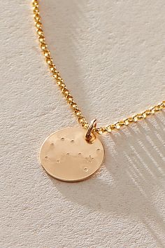 Add a personalized touch to your everyday jewelry with this cool constellation necklace featuring a durable 14k gold-filled design and hand-stamped detailing with a classic linked chain and lobster clasp closure. **Features:** Gold-filled sterling silver, hypoallergenic, durable design, disc-shaped pendant with constellation design, hand-stamped detail, classic chain with lobster clasp closure, fixed length **Why We ❤ It:** This dainty necklace makes for a great gift! | OXB Sweatproof Constellat Scorpio Color, Constellation Design, Gemini And Sagittarius, Pisces And Capricorn, Scorpio Necklace, Gemini And Virgo, Talisman Necklace, Fringed Belt, Trending Necklaces