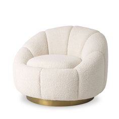 a white chair with gold legs and a round seat