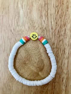 This is a retro smiley face bracelet that is suitable for any age and gender. it has an elastic band and no clip/clasp. Beaded Bracelets, Jewellery Bracelets, Smiley Face Bracelet, Retro Smiley Face, Smiley Face, Lebanon, Elastic Band, Smiley, Jewelry Bracelets