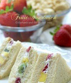 two pieces of fruit sandwich on a white plate