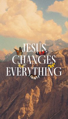 the words jesus changes everything are displayed on a phone screen with mountains in the background