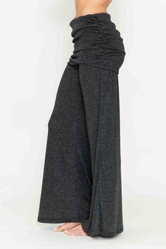 Experience comfort and sophistication with our Chatoyant wide leg palazzo pants, featuring a heather knit rib fabric for an elegant and luxurious touch. The adjustable foldover waistband allows for extra support and can be styled minimally for a high-waist look or folded wide. Perfect for any occasion, these lounge pants offer a comfortable and stretchy pull-on fit with flexible sizing for all women. Made in the USA with a blend of Polyester and Rayon, these pants are suitable for year-round wear, whether for everyday activities or special occasions such as travel, vacations, or resort getaways. Gray Stretch Wide Leg Pants For Fall, Stretch Gray Wide Leg Pants For Fall, Maxi Length Bottoms With Elastic Waistband For Fall, Chic Stretch Gray Wide Leg Pants, Chic Gray Stretch Wide Leg Pants, Fall Maxi Length Bottoms With Elastic Waistband, Chic Solid Color Wide Leg Yoga Pants, Fall Wide Leg Yoga Pants With Elastic Waistband, Casual Maxi Bottoms For Fall