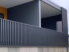 the side of a building with metal slats on it