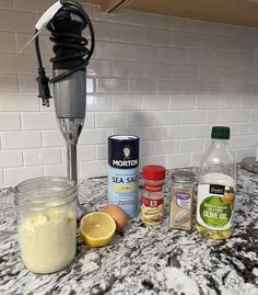 ingredients to make lemonade sitting on a counter top