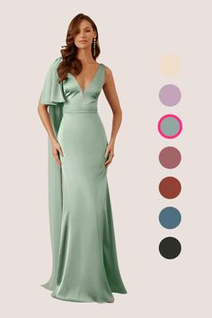 a woman in a long green dress standing next to color swatches and the colors