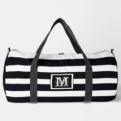 black and white striped duffle bag with monogrammed m