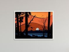 an orange sunset with trees and hills in the background