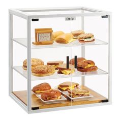 three tiered display case with sandwiches and pastries on the bottom shelf in front of white background