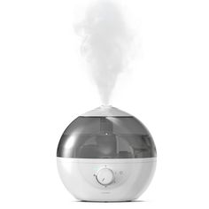 an air humider with steam coming out of it's top, on a white background