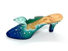 "Just the Right Shoe" by Raine Willitts Designs c.1999. Embellished with rhinestones and other bling, this shoe in beautiful sea colors is titled "The Wave".  In very good condition, with light scratches on the toe. Sea Colour, Beautiful Sea, The Wave, Collectible Figurines, Designer Shoes, Art Collection, Figurines, Heels, Boots