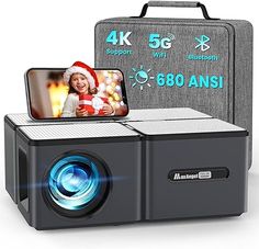 an image of a projector with a christmas hat on it and a camera attached to the front