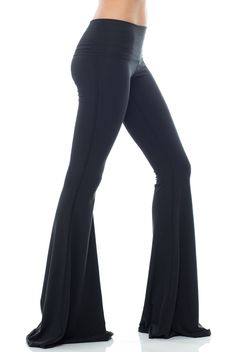 With a classic hue the Teeki Solid Black Bell Bottom will be your new go-to. This Teeki bell bottom offers an all new length 3 inches longer than the original style, allowing you to cut them to your perfect length! A chic Black hue makes the Teeki Bell Bottoms easy to wear and easy to pair with practically anything! Made of a soft recycled water bottle fabric, with breathability, and 4-way stretch, this pant ensures freedom of movement with minimal impact on the earth. With a Black Leggings, Black Bell Bottom, Legging Fits, Fun Pants, Bell Bottom, Wide Waistband, Bell Bottoms, The Earth, Yoga Pants