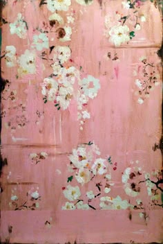 a pink background with white flowers on it