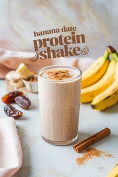 banana date protein shake in a glass with cinnamon on the side