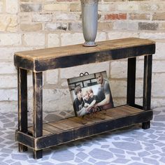 a wooden table with a photo frame on it