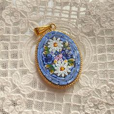 Italian Florentine Micromosaic Jewelry, a brand new product in vintage antique style, made in Italy. Wedding gift.🇮🇹 🩰This is made to order and needs 3-6 weeks to make. It's a brand new product but made in vintage style. CM.2.5x3.5 The price is for one single piece. ⚜️You can choose a background color(Option: primary color) Random floral patterns, our products are manufactured and completed with meticulous work by a mosaicist using Murano glass and enamels.  Each piece is produced individually, completely handmade by craftsmen employing a variety of colors, patterns, and motifs.  Please note: Each item comes differently and we cannot guarantee which one you will receive. 🩰More items on our webside https://laballerinagallery.com Information: laballerinagallery@gmail.com Mosaic Pendants, Micro Mosaic Jewelry, Mosaic Jewelry, Italy Vintage, Gold Pendant Jewelry, Antique Wedding, Pretty Pendant, Micro Mosaic, Italian Jewelry