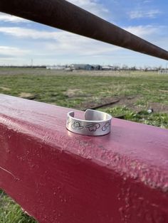 This adjustable ring stamped with Cody hats is the perfect addition to any outfit! Cowboy Hat, Adjustable Ring, Metal Stamping, Adjustable Rings, Aesthetic Fashion, Rings Statement, Cowboy Hats, Statement Rings, Cowboy