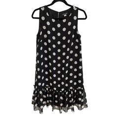 Tommy Hilfiger Women's Dress Black & White Polka Dot Ruffle Hem Sleeveless Back Zipper Back Keyhole With Button Closure Size 4 Armpit To Armpit 17 Inches Length 37 Inches 100 Percent Polyester 42a Mock Wrap Dress, Red Sleeveless Dress, Tommy Hilfiger Dress, Belted Shirt Dress, Ruffle Hem Dress, Sleeveless Sheath Dress, Black Sleeveless Dress, Dress Shirts For Women, Black White Fashion