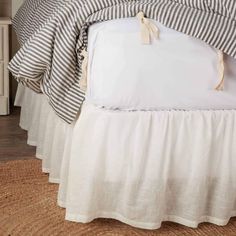 PRICES MAY VARY. One Queen Bedskirt, fits a queen boxspring, 60" x 80" decking, with a 16" drop from the top of the boxspring to the floor. Features split corners so it fits around any bed foot board. Simple styling to coordinate with any bedding. Bed skirt is gathered. 100% cotton with a slub weave that provides beautiful linen-like texture in an antique, soft white color. Machine wash cold with like colors on gentle cycle, no chlorine bleach. Tumble dry low, remove promptly, iron as needed. Th Primitive Bedding Kitchen, Sage Bed Skirt, All White Farmhouse Bedding, White Comforter With Bedskirt, Bed Skirt Grey Comforter, Bedskirt With Quilt, Chambray Bed Skirt, Waverly Bed Skirts, Full Size Bedskirts