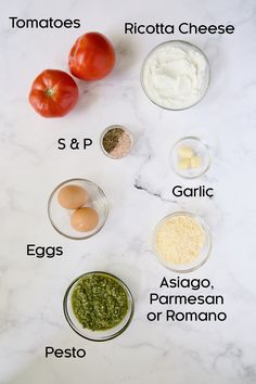 ingredients to make pesto sauce laid out on a white marble counter top with text overlay