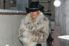 Jennifer Lopez bundled up in a cozy, full-length fur coat before she attended a Chainsmokers concert at Belly Up in Aspen, Colo., on Dec. 27.