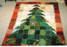 a christmas tree rug is on the floor