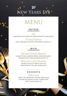 the new years eve menu is displayed on a table