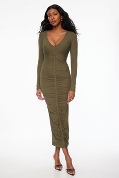 Make a statement with this ribbed dress - Designed to be fitted with a stretch to accentuate your form. Features - V-neck - Front ruching - Long sleeves Size & Fit - Fitted - Stretch fabric Materials & Care - 88% Rayon, 12% Spandex - Machine wash, cold - Imported Ribbed Maxi Dress, Customer Service Gifts, Ribbed Dress, Maxi Dress Green, Dress Size Chart, Fabric Material, Jumpsuit Dress, Stretch Fabric, Jumpsuit Romper